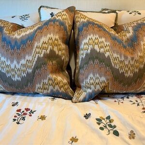 Lee Jofa exclusive designer  flamestich pattern pillows w/feather inserts.